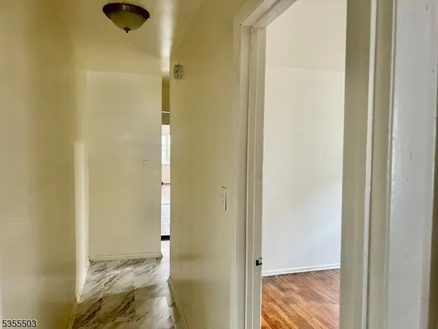 a kitchen with a stove and a microwave