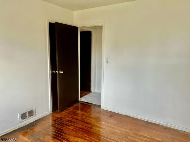 a kitchen with stainless steel appliances granite countertop a stove and a refrigerator