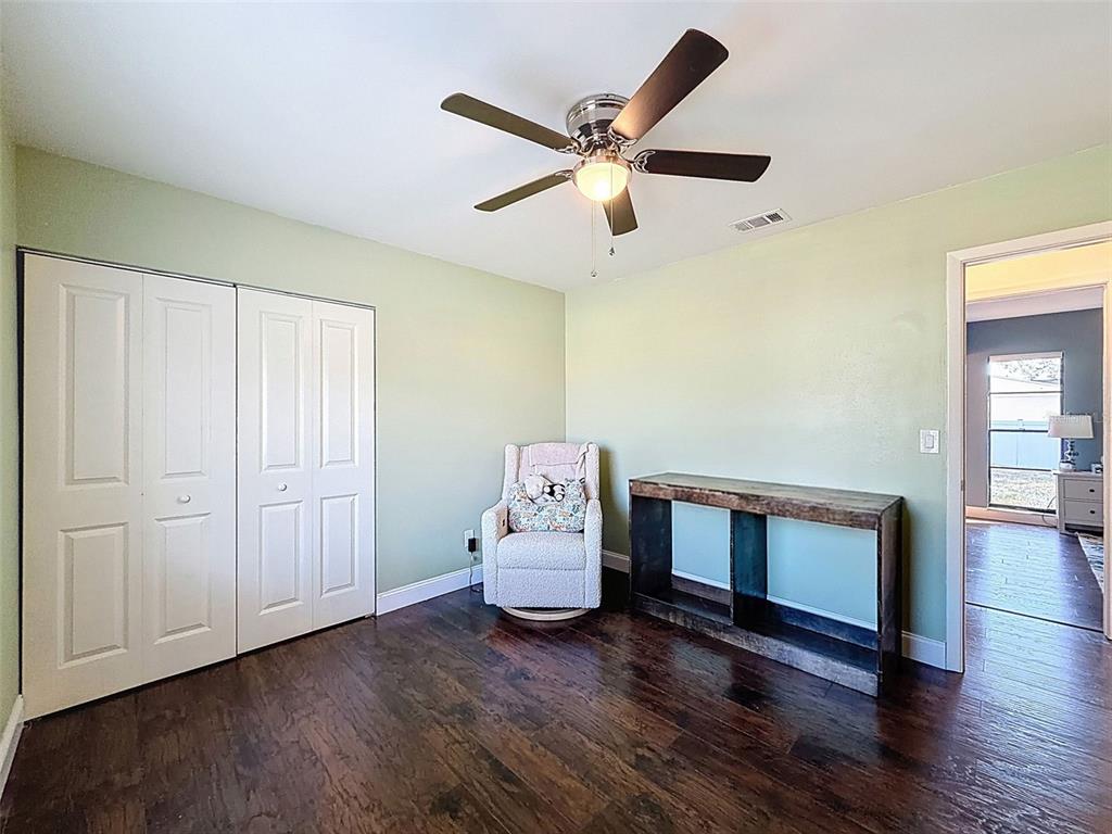 7813 River Ridge Drive Temple Terrace, FL 33637 - Photo 23 of 43 a living room with furniture and wooden floor
