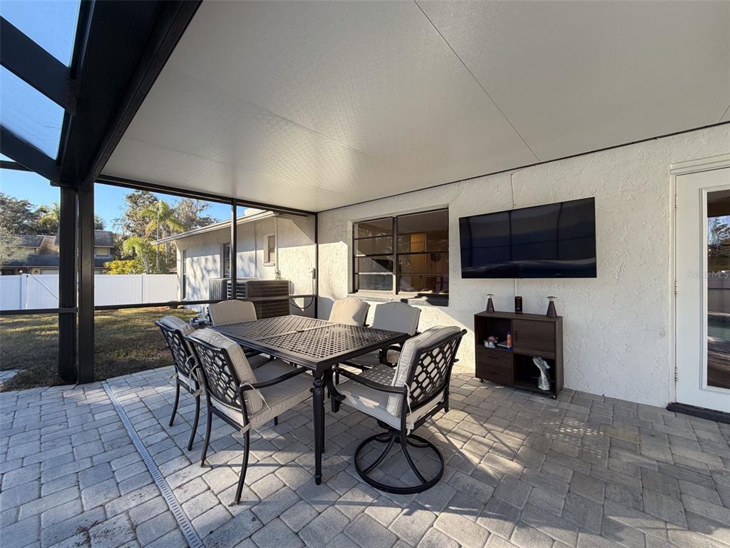 7813 River Ridge Drive Temple Terrace, FL 33637 - Photo 29 of 43 a view of a dining room with furniture window and outside view