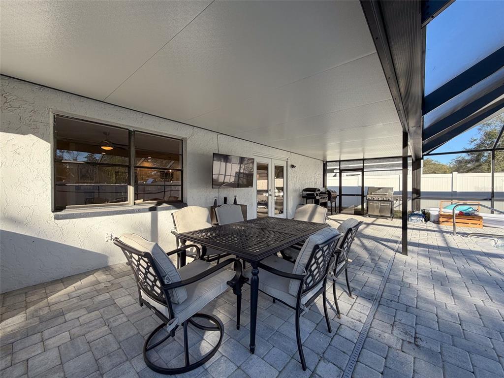 7813 River Ridge Drive Temple Terrace, FL 33637 - Photo 30 of 43 a dining room with furniture and window