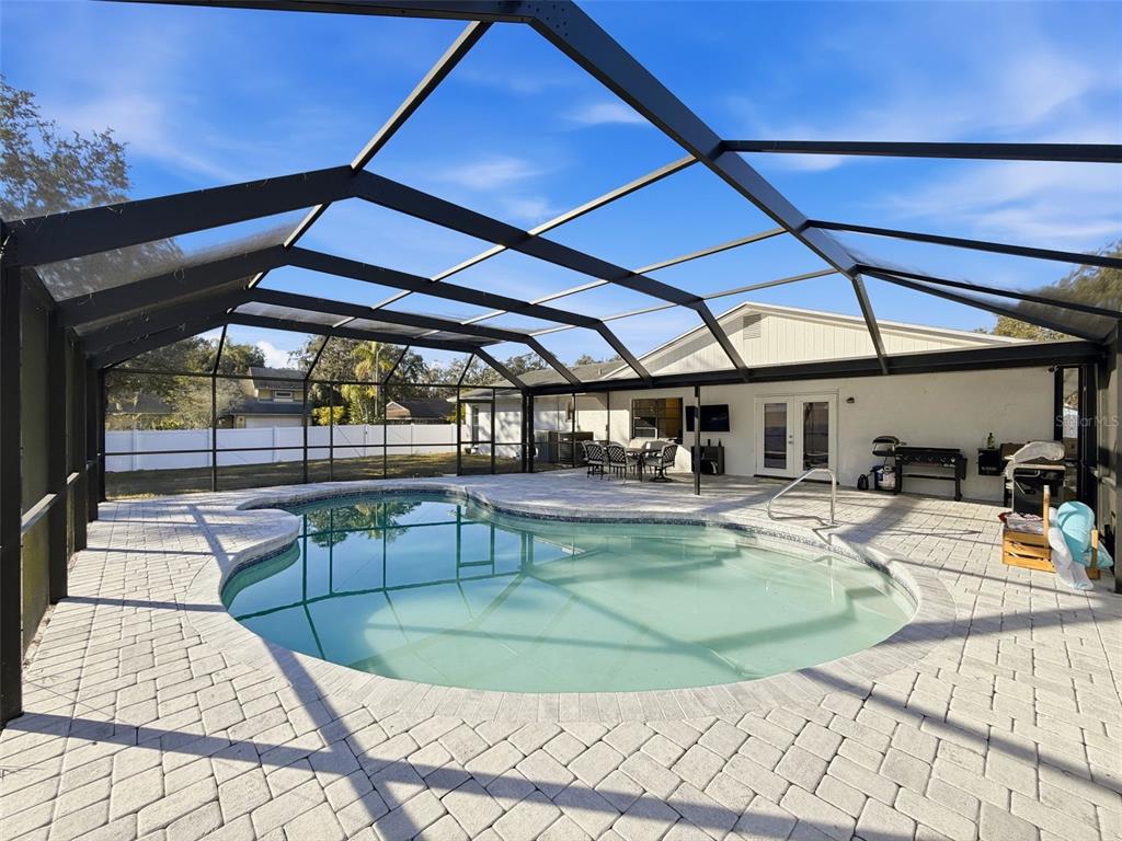 7813 River Ridge Drive Temple Terrace, FL 33637 - Photo 33 of 43 a view of a swimming pool with a patio
