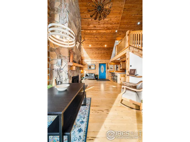 a view of a kitchen with furniture and a kitchen view