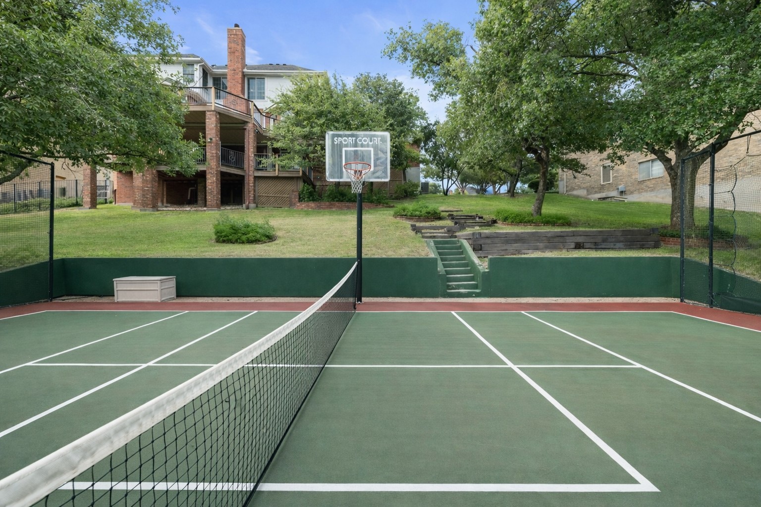 2807 Round Table Road Austin, TX 78746 - Photo 35 of 40 View of tennis court and backyard. Perfect size for pickeball.