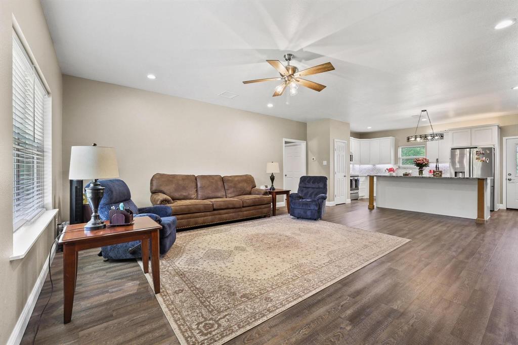 2658 Oak Ridge Road Denison, TX 75021 - Photo 7 of 37 a living room with furniture and kitchen view