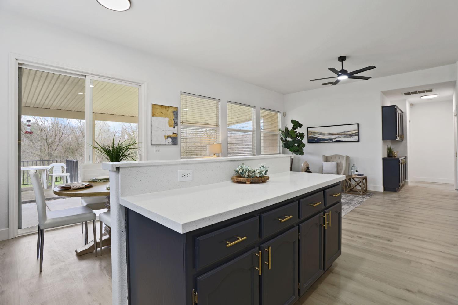 1829 Nighthawk Circle Roseville, CA 95661 - Photo 14 of 34 a view of a kitchen area with furniture and wooden floor