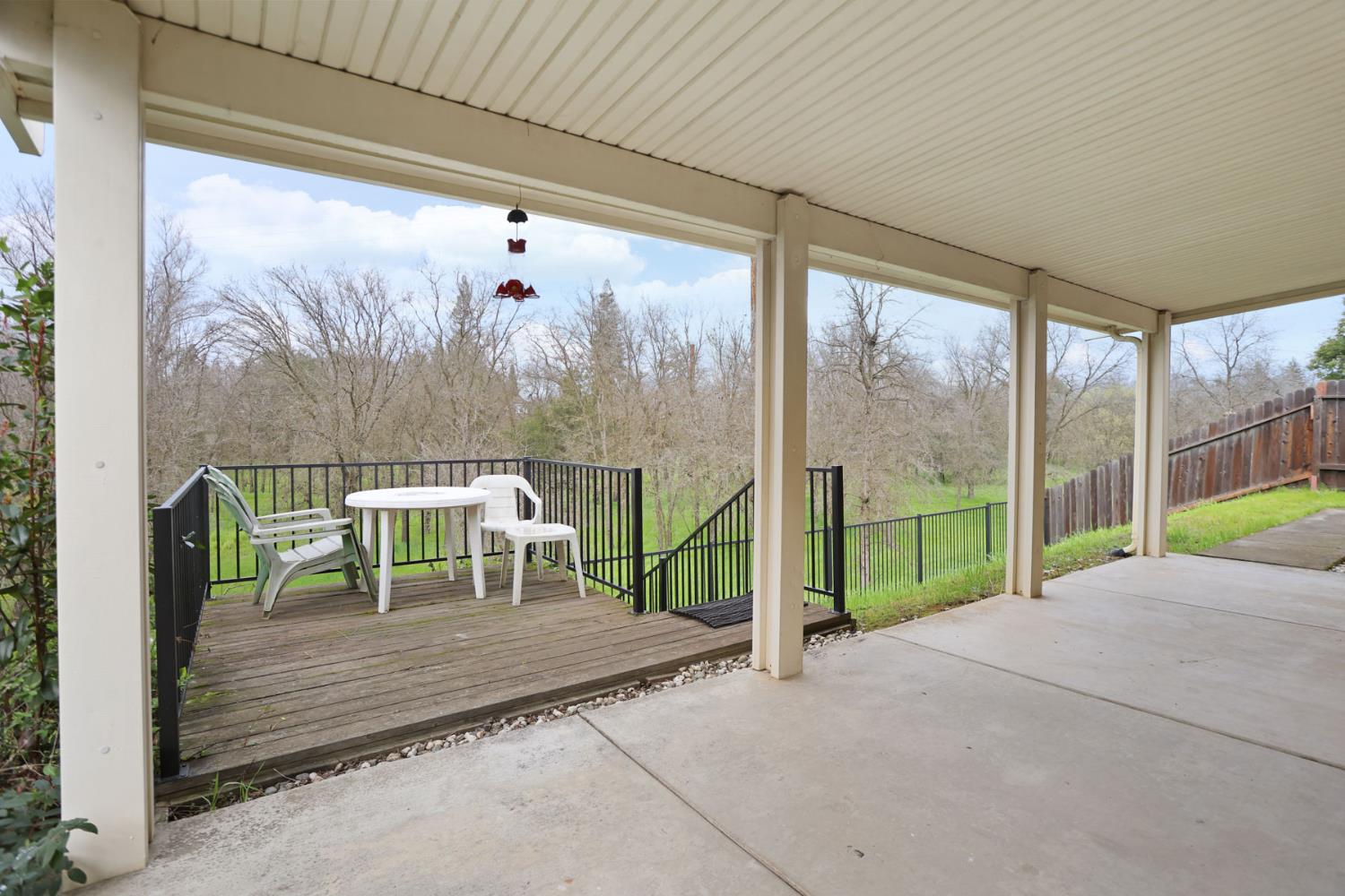 1829 Nighthawk Circle Roseville, CA 95661 - Photo 30 of 34 a view of porch with a table and chairs next to a yard