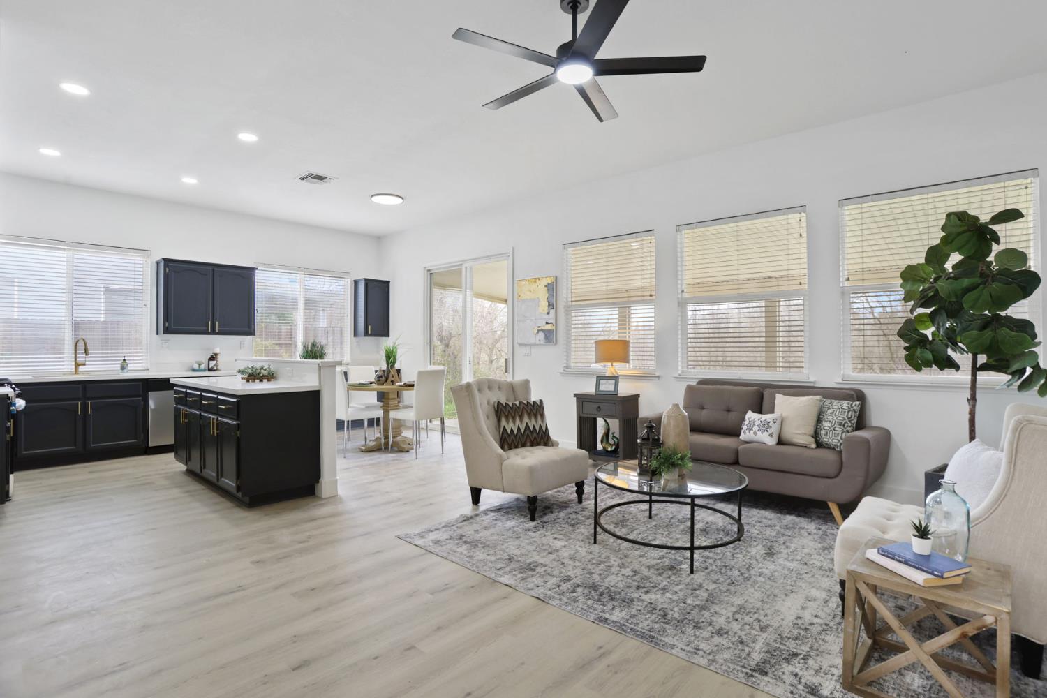 1829 Nighthawk Circle Roseville, CA 95661 - Photo 6 of 34 a living room with furniture and a large window
