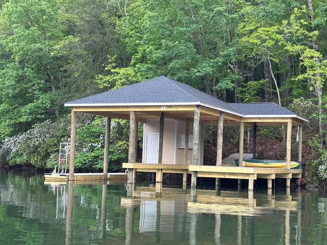a house with river in front of it