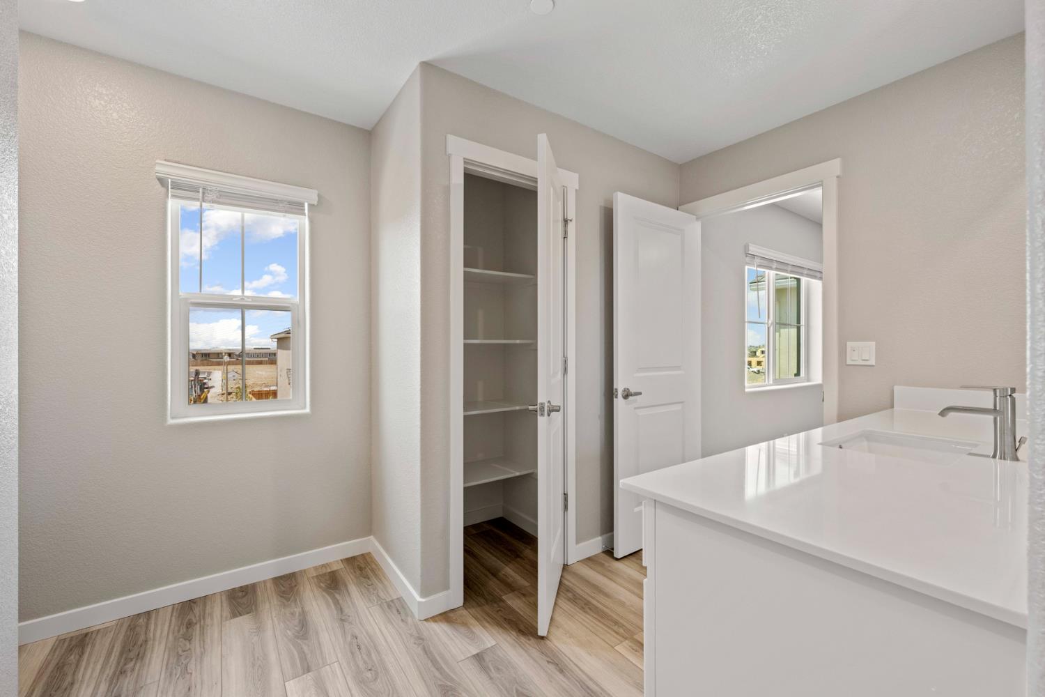 2979 Bowery Lane Lincoln, CA 95648 - Photo 16 of 19 a bathroom with a sink and a window