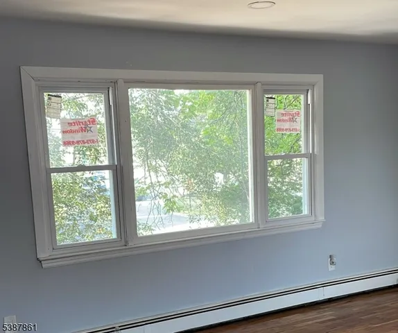 a view of a room that has a window in it