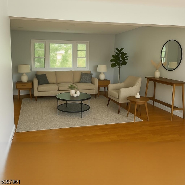 85 Grove Street South Hackensack, NJ 07606 - Photo 5 of 32 a living room with furniture and a large window