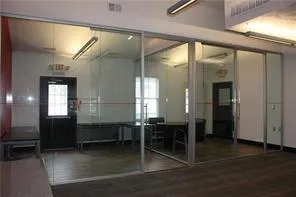 a view of a hallway with the wooden floor