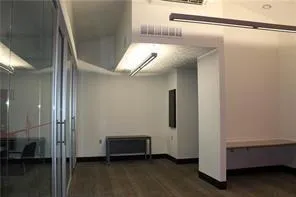 a kitchen with stainless steel appliances granite countertop a refrigerator a stove and a sink