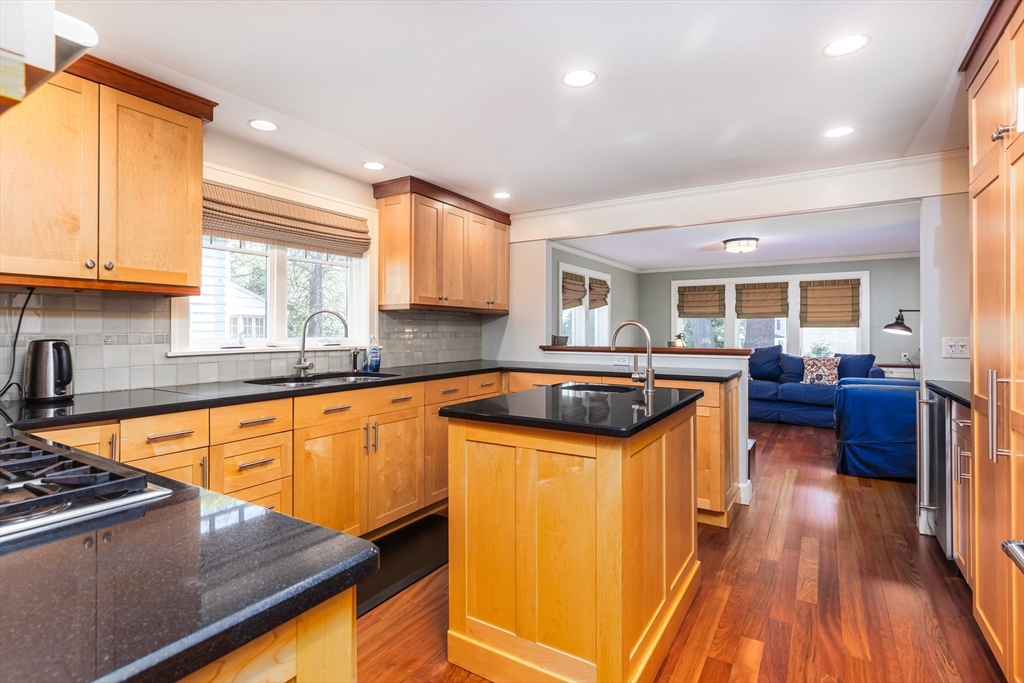 17 Deforest Road Newton, MA 02462 - Photo 8 of 31 a kitchen with stainless steel appliances granite countertop sink stove top oven and cabinets