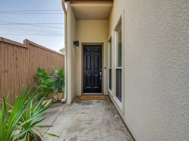 a view of a potted plants in front of door