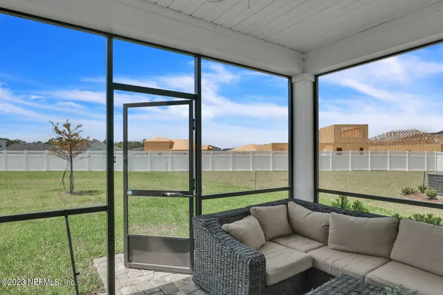 a balcony with furniture and city view