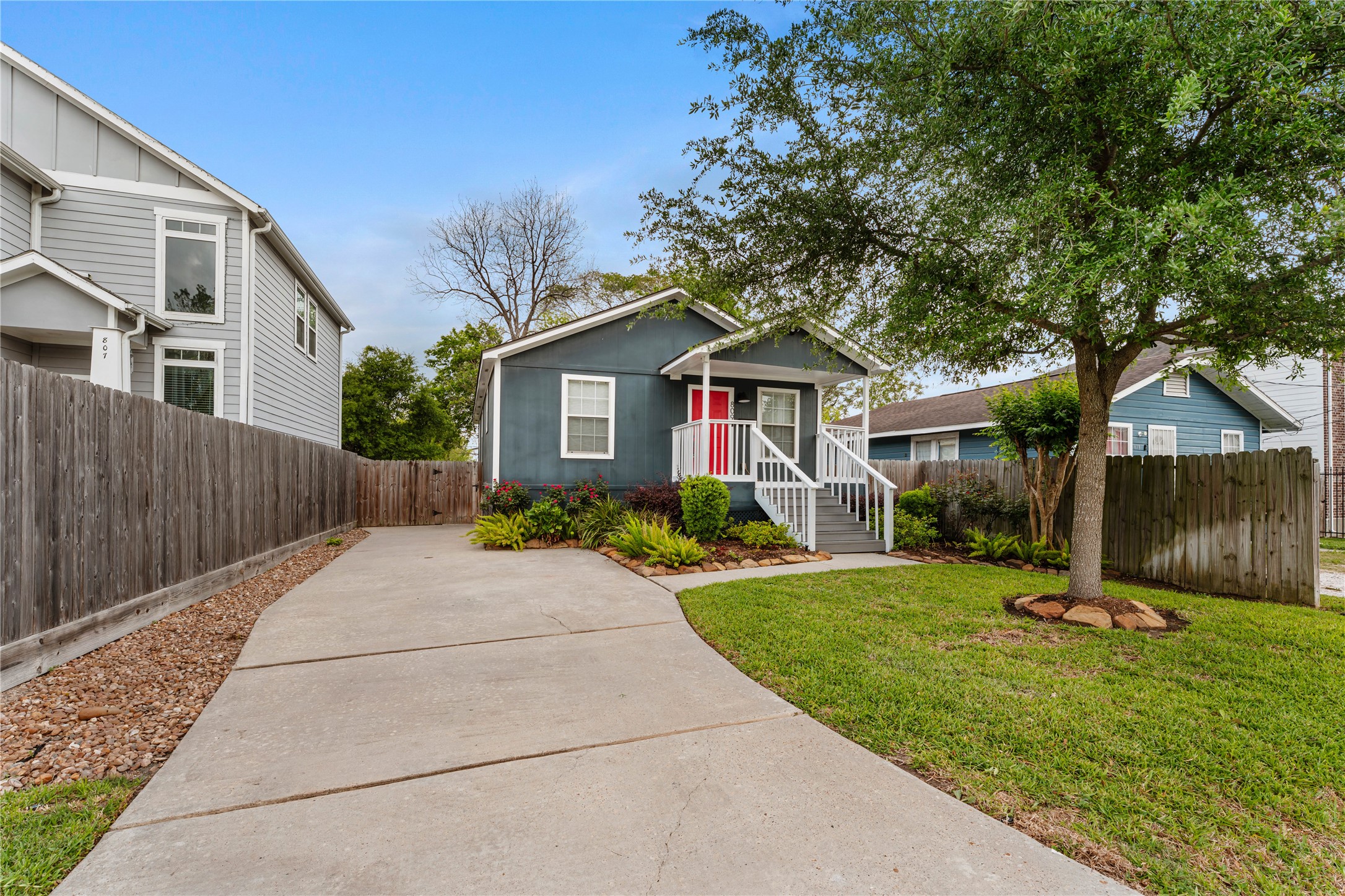 809 East 40th Street Houston, TX 77022 - Photo 3 of 27 Charming curb appeal with mature trees, a private driveway, and beautifully maintained landscaping. This super cute bungalow is located in the heart of Independent Heights, just minutes from Downtown Houston. Energy efficiency shines with Tesla solar panels and a Powerwall 3 backup battery installed in December 2024.