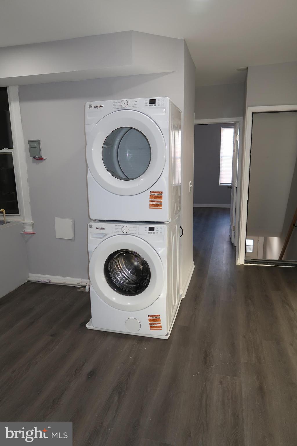 2833 Brendan Avenue, Unit 2 Baltimore, MD 21213 - Photo 5 of 17 a view of a hallway with washer and dryer