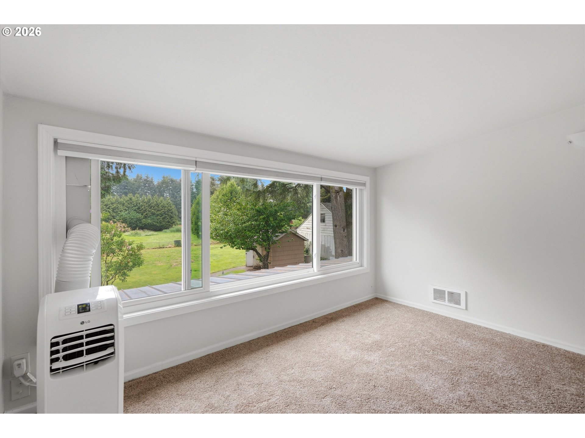 4621 Ohio Street Longview, WA 98632 - Photo 23 of 29 a view of an empty room with a window
