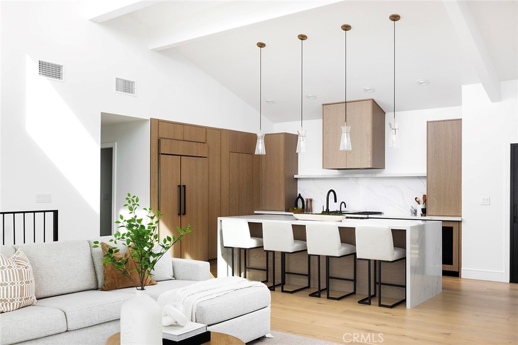 630 Loretta Drive Laguna Beach, CA 92651 - Photo 17 of 75 a kitchen with a table chairs and living room view