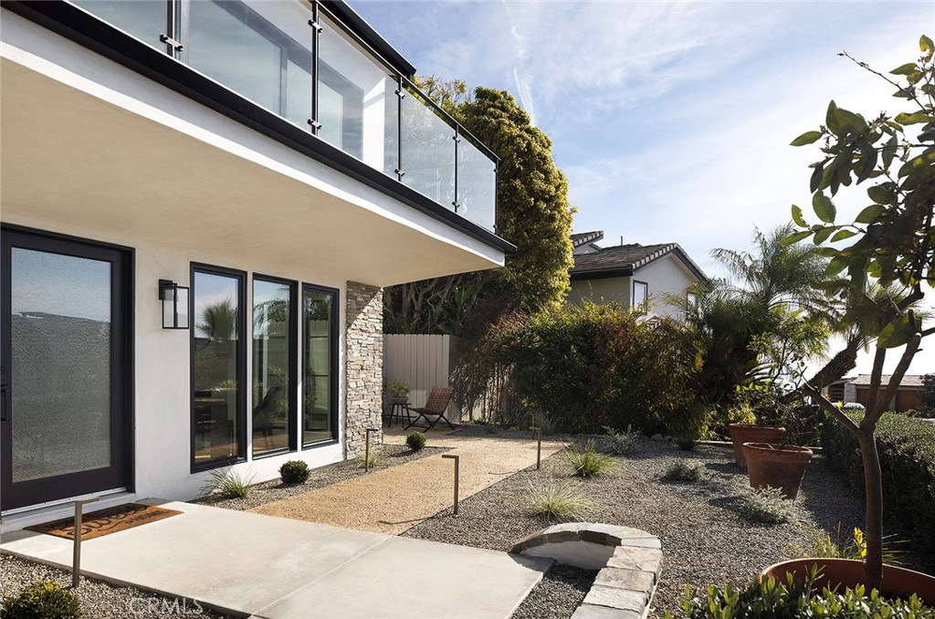 630 Loretta Drive Laguna Beach, CA 92651 - Photo 2 of 75 a backyard of a house with yard fire pit and outdoor seating