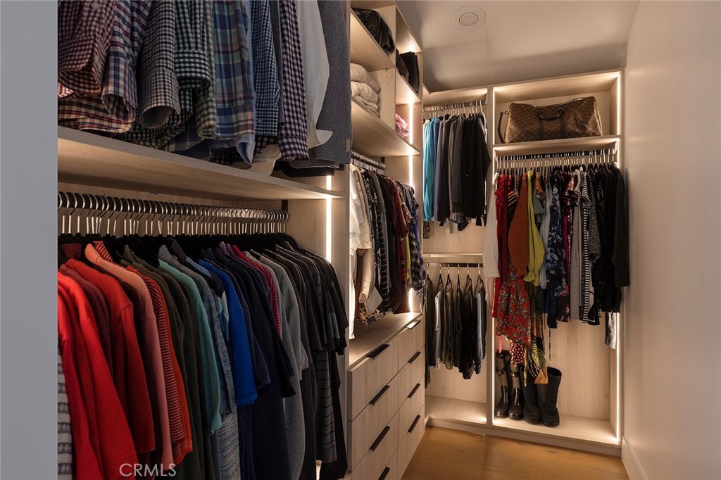 630 Loretta Drive Laguna Beach, CA 92651 - Photo 37 of 75 a view of walk in closet with clothes and shoes