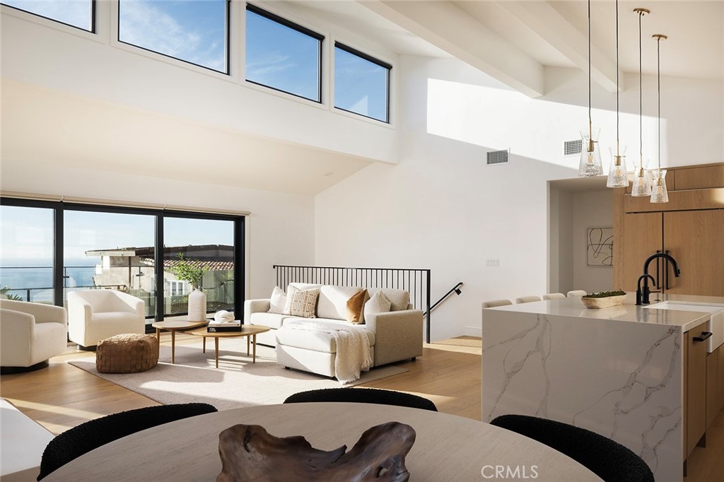 630 Loretta Drive Laguna Beach, CA 92651 - Photo 5 of 75 a living room with furniture and a large window
