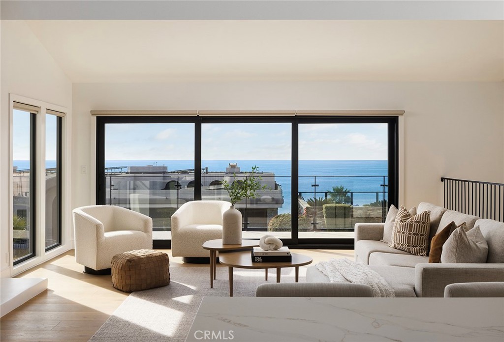 630 Loretta Drive Laguna Beach, CA 92651 - Photo 6 of 75 a living room with furniture and a large window