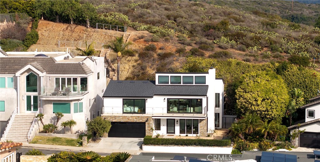 630 Loretta Drive Laguna Beach, CA 92651 - Photo 61 of 75 a front view of a building with a yard