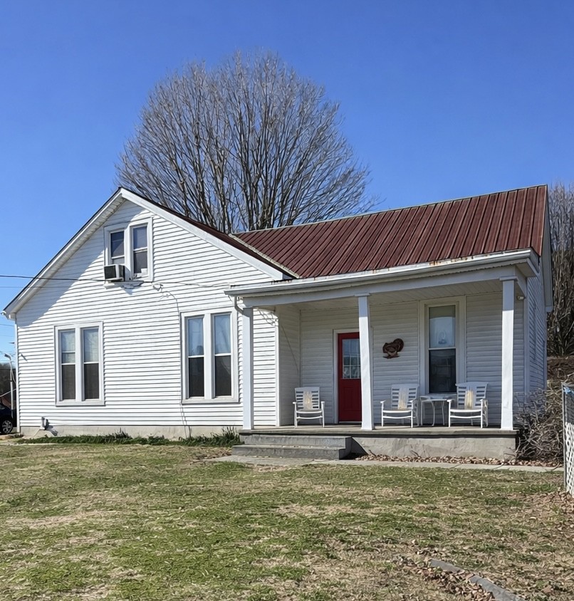 820 State Rte 52 Portland, TN 37148 - Photo 2 of 12 a view of a house with pool and garden