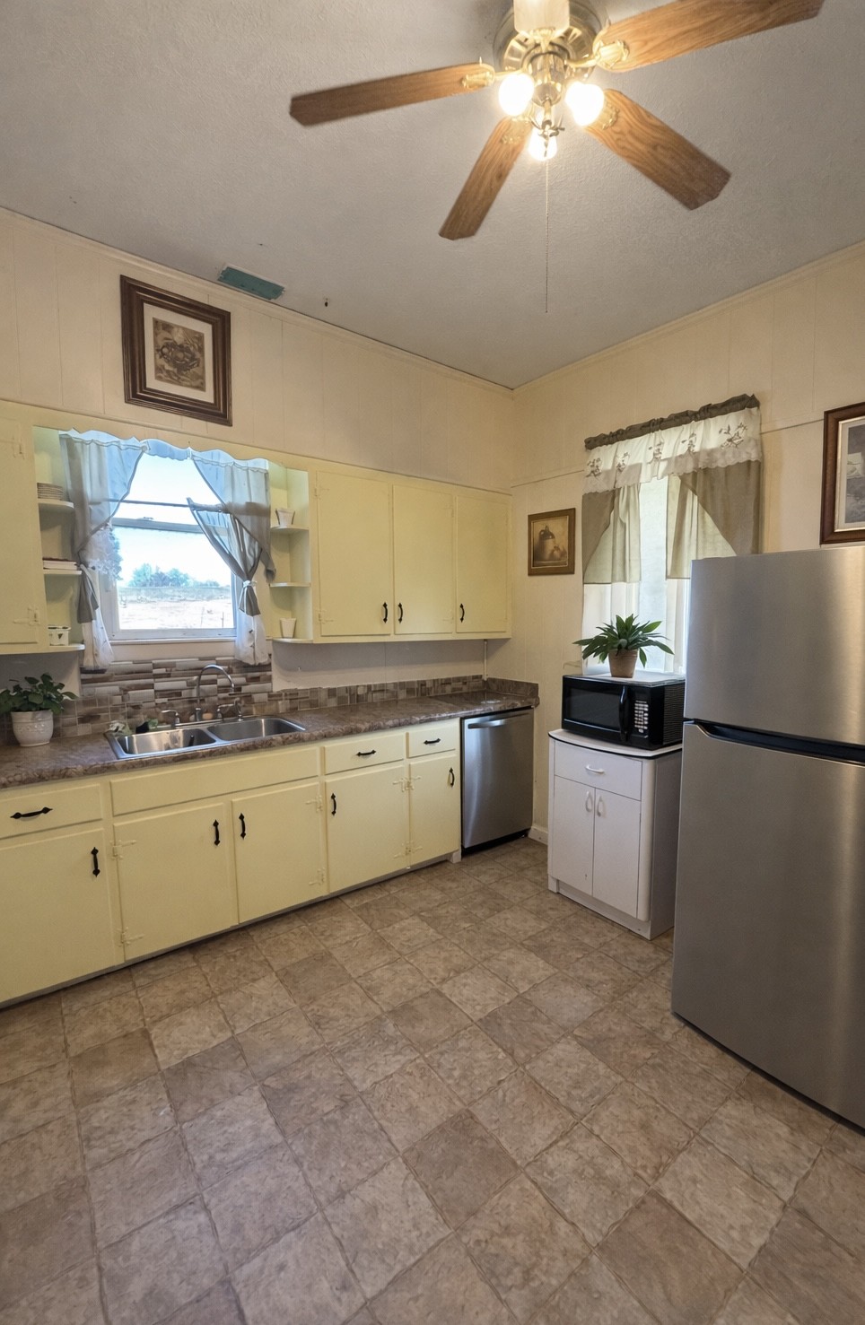 820 State Rte 52 Portland, TN 37148 - Photo 9 of 12 a kitchen with a sink cabinets and window