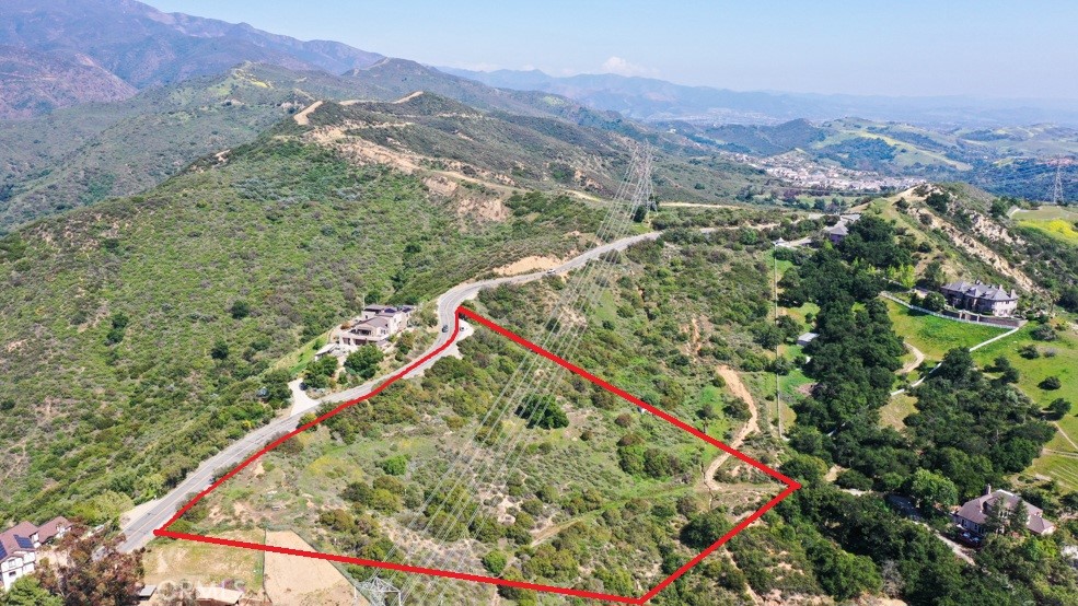 28052 Modjeska Grade Road Silverado, CA 92676 - Photo 1 of 1 an aerial view of a houses with a lush green hillside