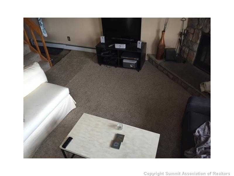 9876 Ryan Gulch Road, Unit 303F Silverthorne, CO 80498 - Photo 15 of 22 Living Room.