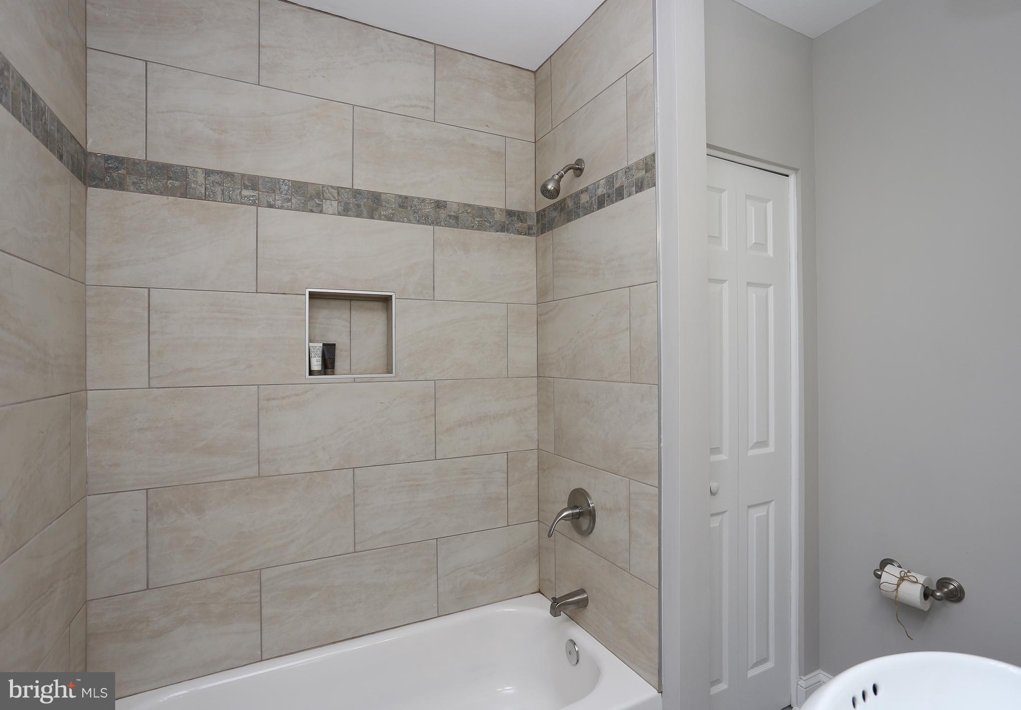 605 Coleraine Road Baltimore, MD 21229 - Photo 15 of 29 Updated tile finishes