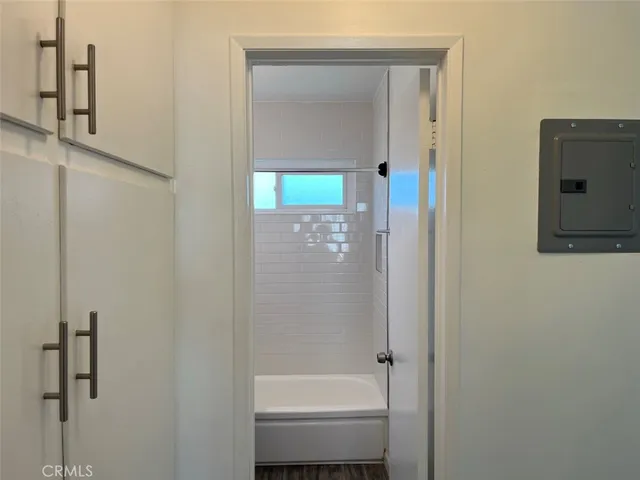 a bathroom with a bathtub and a sink