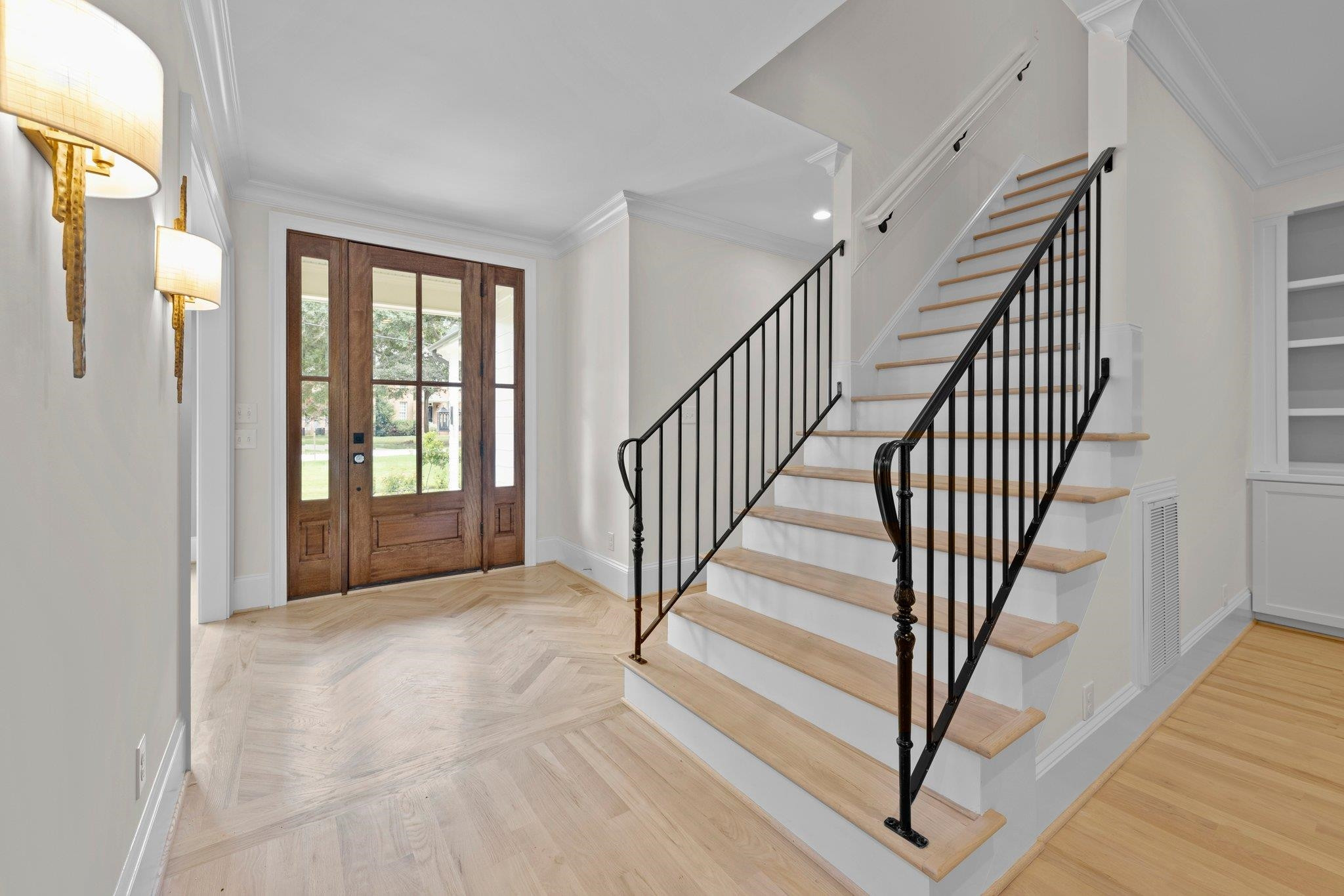 2905 Claremont Road Raleigh, NC 27608 - Photo 3 of 30 Inviting entry into the foyer with hardwood floors through the 1st floor. Foyer