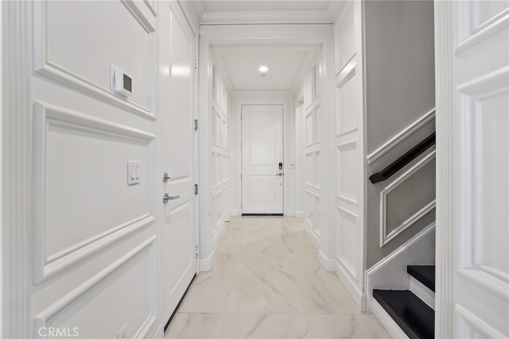 1213 Providence Loop Placentia, CA 92870 - Photo 13 of 43 a view of a hallway with entryway and stairs
