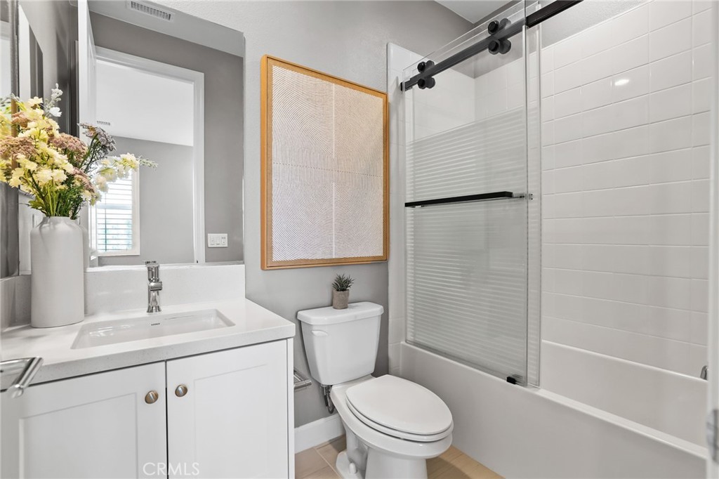 1213 Providence Loop Placentia, CA 92870 - Photo 20 of 43 a bathroom with a sink toilet and shower
