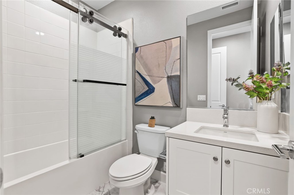 1213 Providence Loop Placentia, CA 92870 - Photo 22 of 43 a bathroom with a sink toilet and shower