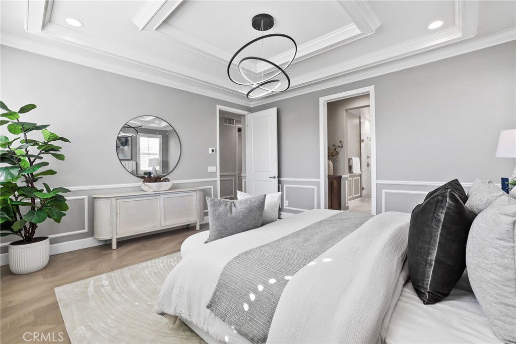 1213 Providence Loop Placentia, CA 92870 - Photo 25 of 43 a bedroom with a bed a potted plant and a dresser