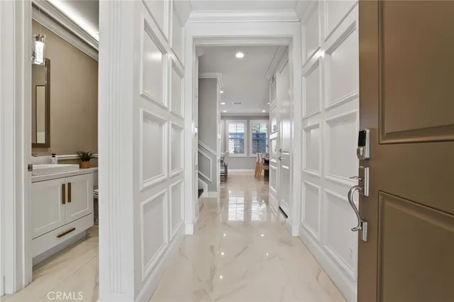 a view of a kitchen with a refrigerator and cabinets