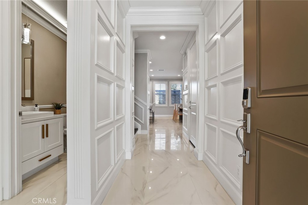 1213 Providence Loop Placentia, CA 92870 - Photo 3 of 43 a view of a kitchen with a refrigerator and cabinets