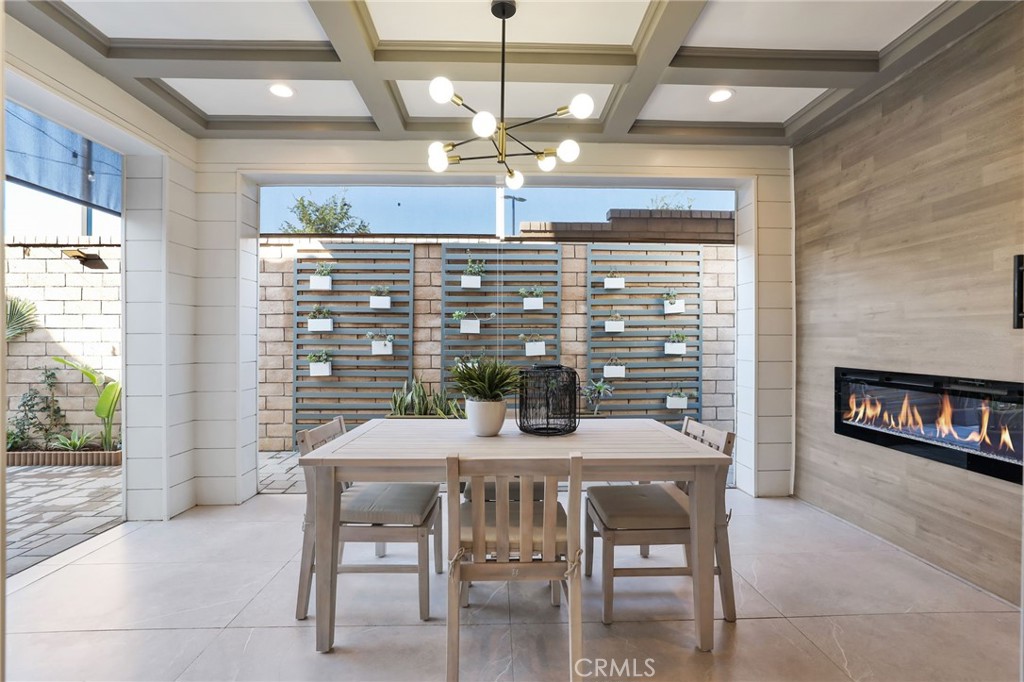 1213 Providence Loop Placentia, CA 92870 - Photo 33 of 43 a table with a vase and a chandelier