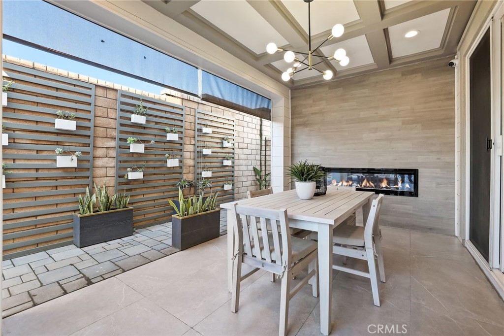 1213 Providence Loop Placentia, CA 92870 - Photo 34 of 43 a view of a dining room with furniture and a chandelier