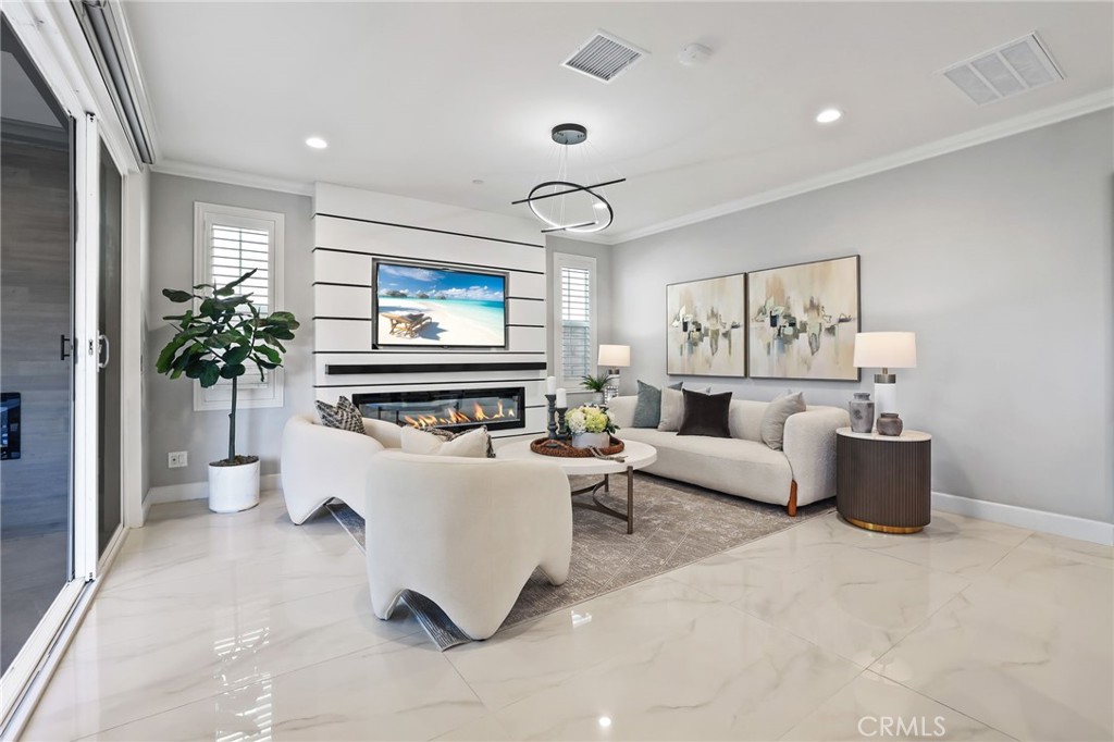 1213 Providence Loop Placentia, CA 92870 - Photo 7 of 43 a living room with furniture and a flat screen tv