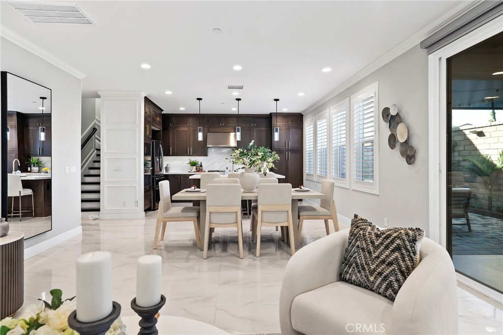 1213 Providence Loop Placentia, CA 92870 - Photo 10 of 43 a living room with furniture kitchen view and a large window
