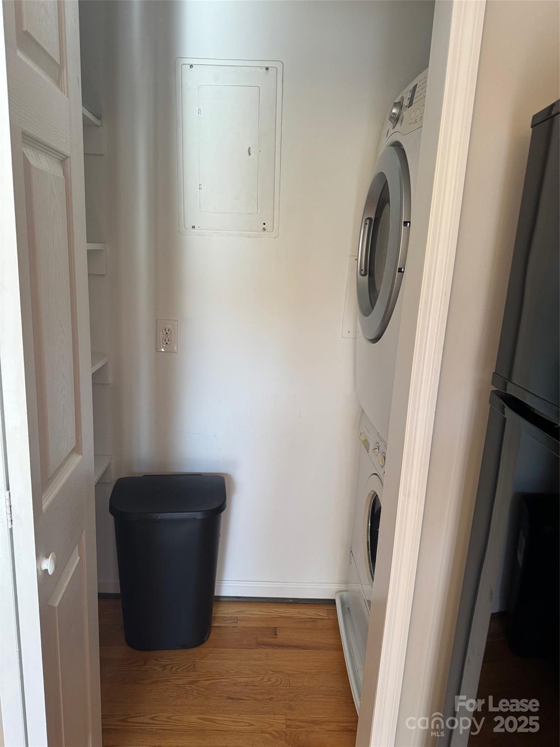 400 Queens Road Charlotte, NC 28207 - Photo 14 of 15 a view of a storage & utility room with dryer and washer