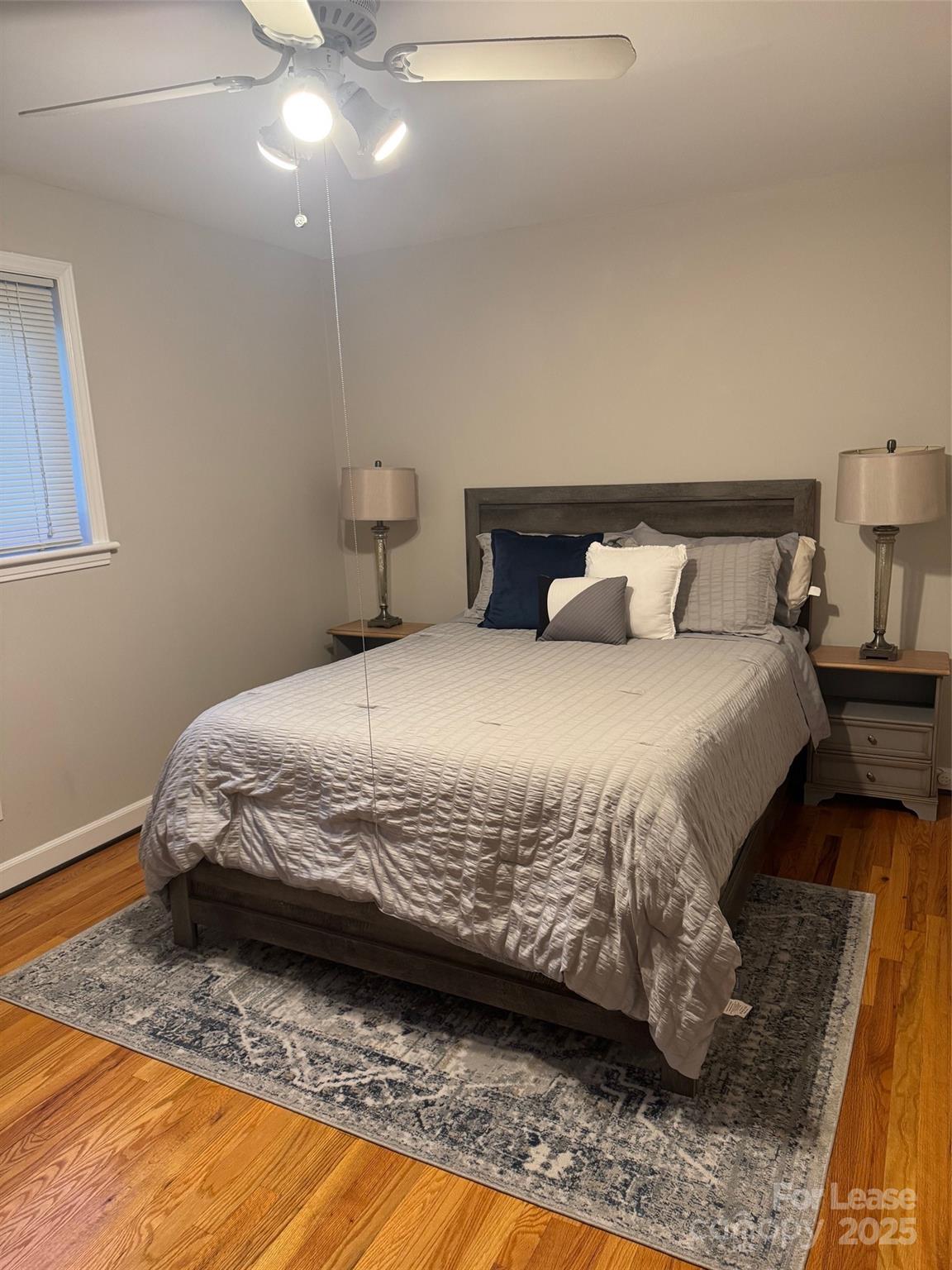 400 Queens Road Charlotte, NC 28207 - Photo 6 of 15 a bedroom with a bed and a night stand