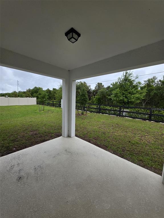 6008 Vision Road St. Cloud, FL 34771 - Photo 28 of 33 a view of a green field with clear sky